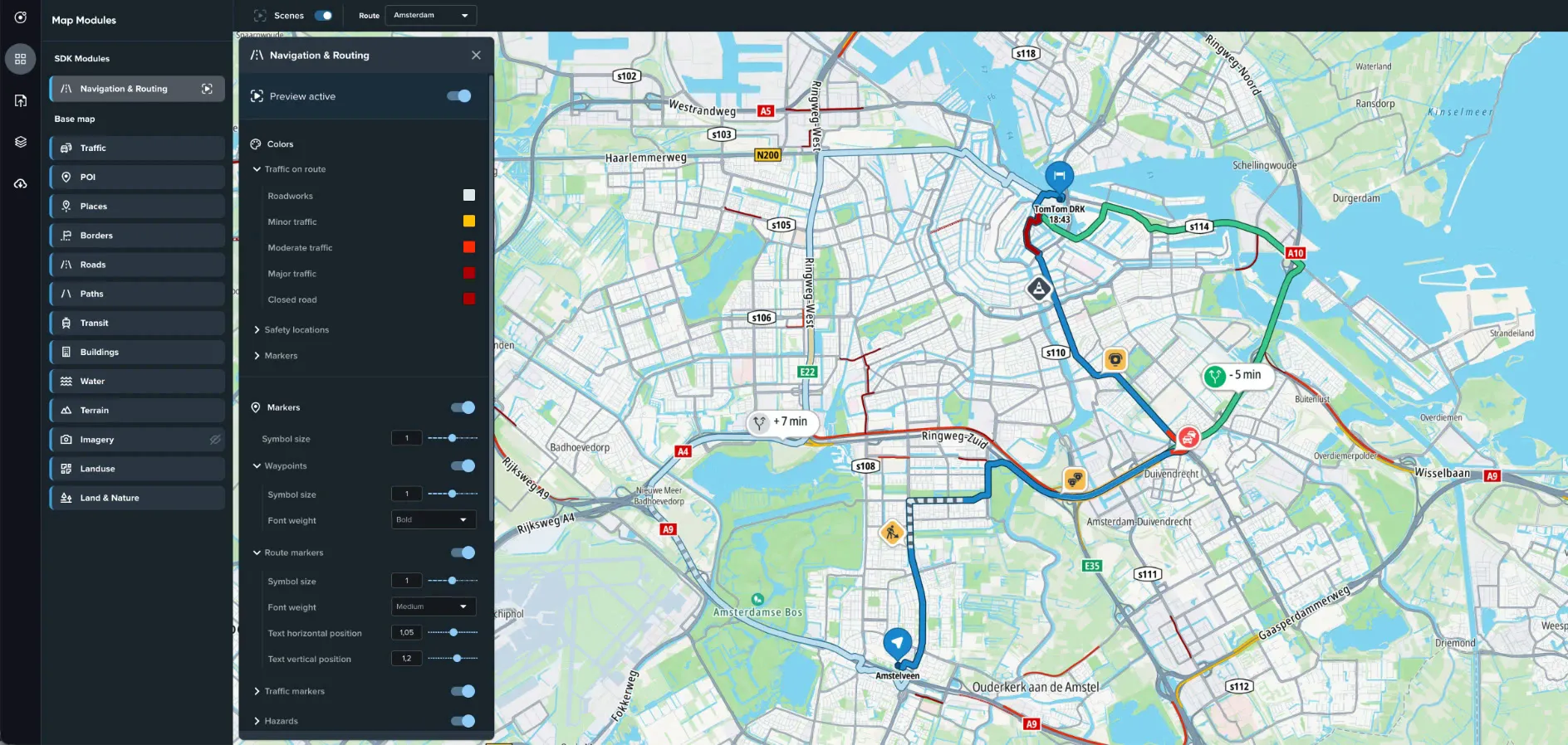 Map Maker editor with the Navigation & Routing module open, showing a route through Amsterdam with traffic on the route, alternative routes and safety location markers